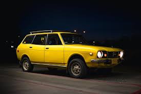 Image result for Herald Yellow 1975 Subaru