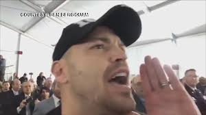 Political activist from Fresno protests during Newsom's oath of office