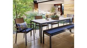 Comfortable upholstered dining chairs from crate and barrel add a feeling of warmth to the table. Alfresco Ii Natural Rectangular Dining Table Reviews Crate And Barrel Outdoor Dining Table Outdoor Dining Outdoor Dining Furniture