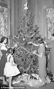 Wishing You A Very Retro Christmas Real Candles In The 1900s A Tinsel Takeover In The 50s And Fake Snow Flocking In The 60s We Reveal How Trees Have Changed Through
