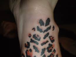In most cases, the spots cover a very small area on arm, shoulder, and side. Leopard Print Tattoos 30 Majestic Collections Design Press