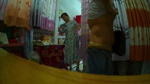 Wanking to an Asian lady in her store | voyeurstyle.com