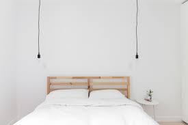 Here, each piece is carefully chosen to work within the small space. 23 Minimalist Bedroom Ideas How To Use Minimalism In Bedroom Design Apartment Therapy