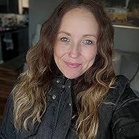 What the Dog Did: Tales from a Formerly Reluctant Dog Owner by Emily Yoffe 