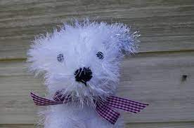 Tinsel yarn has also been used for the collar around the round neckline. Easy Tinsel Puppy Toy Knitting Pattern By Fiona Goble Download Justhands On Tv