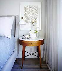 Brighten your entryway with plug in wall lights, or spark conversation with a unique lamp. Proof That Great Design Does Not Always Come With Big Price Tags Bedside Tables And Bed From West Bedroom Night Stands Marble Tables Design Round Nightstand