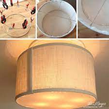 There are metal bars holding the lights at a distance from the walls, and herein lies the beauty of the drum shades. Diy Drum Shade With Burlap 9th Mayne Diy Drum Shade Diy Lamp Shade Diy Drums