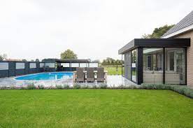 nieuwe toepassing veranda afgewerkt met aluminium dakrandoversteken mato huisstijl huis buitenkant veranda