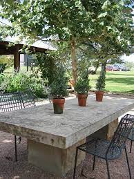 The sleek metal frame and clean angles add the perfect modern twist to any space, while the unique construction keeps your small space clutter free. Limestone Table Small Garden Table Concrete Outdoor Table Round Outdoor Dining Table