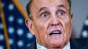 Watch Rudy Giuliani Appears To Sweat Hair Dye Down Face