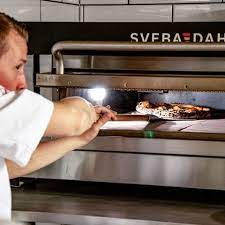 Most people love the taste and texture of a pizza baked in a real pizza oven but not everyone has the luxury of owning one. Electric High Temp Pizza Oven From Sveba Dahlen