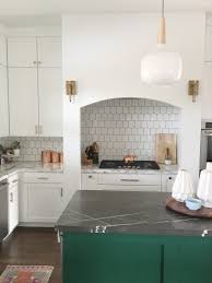 Ceramic Elephant Designs Emerald Green Cabinets Green Island Black Marble Honey Comb Backsplash Green Kitchen Island Green Kitchen Cabinets Green Kitchen
