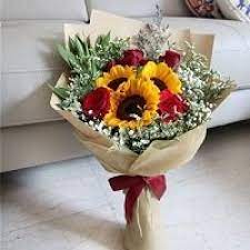 If your zipcode doesn't work then that's not a location that we can guarantee delivery. Sunflower And Roses Bouquet