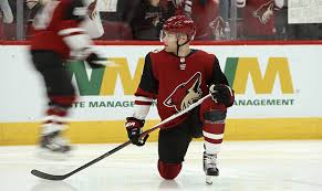 I saw a picture of a young kid playing and instrument. Taylor Hall New Coyotes Gm Didn T Speak Before Hall Signed With Sabres