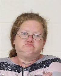 Lovers accused of conspiring to kill police informant from jail