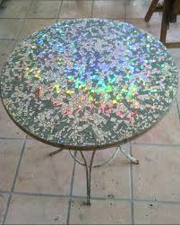 How do you make a mosaic table? How To Make Mosaic Cd Garden Table Craftspiration Handimania
