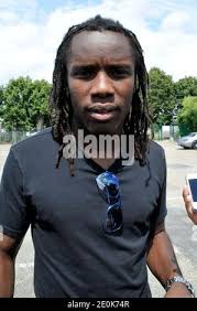 PSG's Peguy Luyindula arrives for the soccer training session at Camp Des  Loges in Saint-Germain en Laye near Paris, France