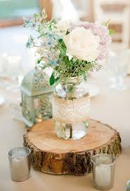 Create the perfect rustic wedding centerpiece table décor for under $25. Rustic Inspired Outdoor Wedding Rustic Wedding Chic Rustic Wedding Centerpieces Country Wedding Decorations Cheap Wedding Decorations