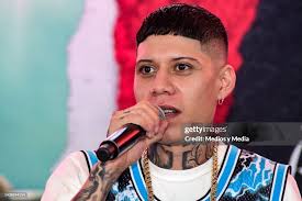 Singer Angel Quezada of the Santa Fe Klan speaks during a press... News  Photo