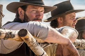 Seven gunmen from a variety of backgrounds are brought together by a vengeful young widow to protect her town from the private army of a destructive industrialist. The Magnificent Seven Production Stills The Magnificent Seven Luke Grimes Magnificent Seven Luke Grimes