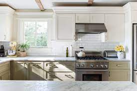 Families love the updated farmhouse look with modern amenities. Best Cabinet Doors For Modern Farmhouse Style Kitchens Apartment Therapy