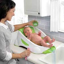 Below you'll find a few signs and symptoms of a baby overheating: Munchkin Clean Cradle Non Slip Infant Bather With Inclined Headrest Green Walmart Com Baby Bath Tub Baby Bath Baby Tub