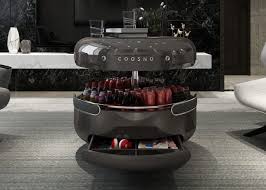 This shining, futuristic, and sleek coffee table serves as a sound system, refrigerator, party hub, and storage space for any room in your home. Coosno Smart Coffee Table From 329 Geeky Gadgets