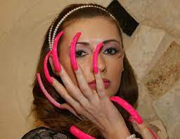 Eye to eye three fools did once sacrifice, to win a contest long ago. Fear And Loathing At The Local Wireless Store Frank S World Woman With Longest Nails Long Nails Very Long Nails