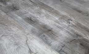 You might be surprised to learn that porcelain tile can be manufactured to appear just like aged wood planks. Wood Look Porcelain Plank Monterrey Tile Company