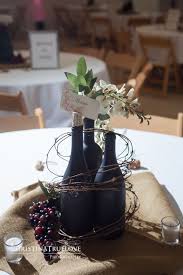 Pin By Diane Adams On Wine Themed Wedding Ideas Vineyard Wedding Centerpieces Wine Theme Wedding Wine Bottle Centerpieces