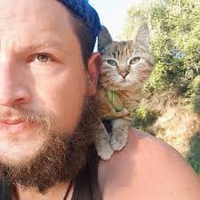 Guy Biking Across The World Picks Up A Stray Kitten