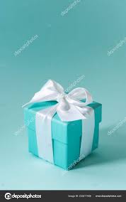 Tiffany Blue Color Box Tied White Silk Ribbon Pastel Background Stock Photo  by ©pinkasevich 233211438