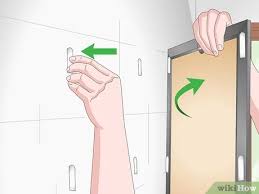 I show an easy & safe way to remove a glued mirror off a wall. 3 Simple Ways To Hang A Mirror On A Wall Without Nails Wikihow