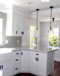 On white cabinets, they are the perfect option for a chic cabin kitchen or even an outdoorsy opt for these pretty vintage handles that will bring both color and nostalgia into your kitchen. White Kitchen Cabinets Black Handles Black Kitchen Handles Kitchen Cabinets Kitchen Cabinet Handles