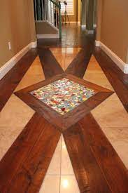 Entry Floor Design Distressed Walnut Hardwood Travertine Tiles Broken Mexican Tiles To Create A Mosaic Wood Floor Design Floor Design Mosaic Flooring