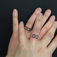 Infinity Ring Tattoo For Couples Tattoo Wedding Rings Infinity Tattoos Ring Tattoos