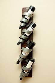 These wooden wine racks are very natural and clean in appearance and quite appropriate for your room, in fact all the types of wine wooden racks p erfect for dining room or kitchen, this decorative wine rack has an abstract styling. 24 Unique Handmade Wine Rack Designs