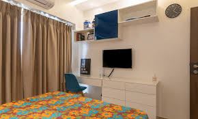 Colorful kids' bedroom idea matching decor accentuates the look of the bedroom red and blue is a popular color scheme in the kids' bedroom turn a loft bed into a bunk bed with some innovative planning Study Table Ideas In Bedroom For Your Home Design Cafe