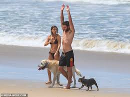Liam hemsworth might be dating gabriella brooks after he was photographed introducing the model to his parents in australia over the weekend amid his the two sparked romance rumors after the daily mail published photos that see brooks meeting craig and leonie hemsworth. Shirtless Liam Hemsworth Packs On Pda With Bikini Clad Girlfriend Gabriella Brooks On Byron Beach Duk News