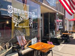 — at shooters grill, you can decide whether your freshly made cherry pie comes with ice cream, but you have no choice on who delivers it: Garfield County Shutters Shooters Grill Kdnk