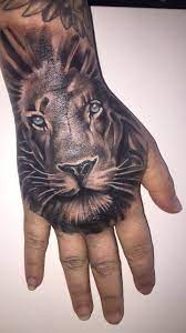 Mums Hand Tattoo Sc Chxrla Xox Lion Tattoo Lion Hand Tattoo Hand Tattoos Pictures Cool Chest Tattoos