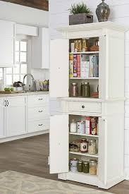 80 pretty and practical kitchen pantries 15 smart ideas from beautifully organized pantries kitchen confidential: 21 Easy Ways To Add Extra Storage To Your Kitchen Purewow Home Organizing Kitchen Sho Extra Kitchen Storage Kitchen Cabinet Storage Simple Kitchen Remodel