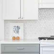 If you jump over to just about any of our flooring tends articles, you'll find that gray has been taking over flooring for a few. White Top Cabinets Gray Bottom Cabinets Design Ideas