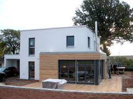 Ein einfamilienhaus soll an der rückseite einen doppelstöckigen anbau auf einer grundfläche von 4 m x 5 m e erhalten. Haus Mit Holzanbau Modern Hauser Koln Von Architekturburo Peter Holdenried Houzz