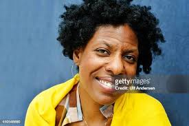 25 June Mathis Holding Stock Photos, High-Res Pictures, and Images