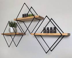 One surefire way to add an embellishment to your home decor is to search for creative and decorative shelves to put up on your walls. Wall Decor Ideas Geometric Wall Shelves By Village Craft Co