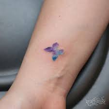 Sprout And Tiny Butterfly Tattoo Tiny Butterfly Tattoos Butterfly Tattoos Crayon Tiny Tattoos Tiny Butterfly Tattoo Tattoos For Daughters