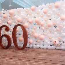 60th Birthday Flowers And Balloons Balloon Photo Booth Backdrop For A 60th Birthday Celebration Balloondecor Balloon Table Decorations Birthday Photo Booths Birthday Backdrop