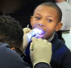 West Haven school lounge serves as dental clinic for a day (video)