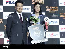 11th Apr, 2023. Pro volleyball MVP Kim Yeon-koung (R) of the Heungkuk Life  Pink Spiders poses for a photo with Cho Won-tae, president of the Korean  Volleyball Federation, after winning the MVP